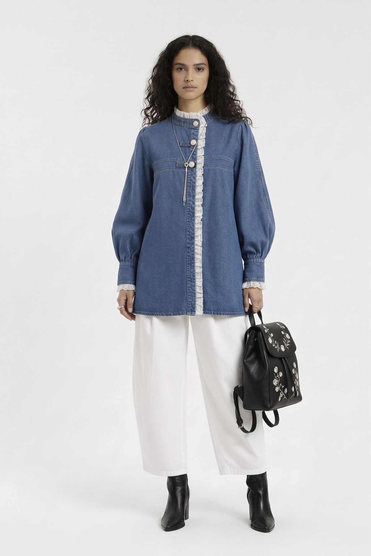 Maria Blouse in mid-blue denim with white trousers